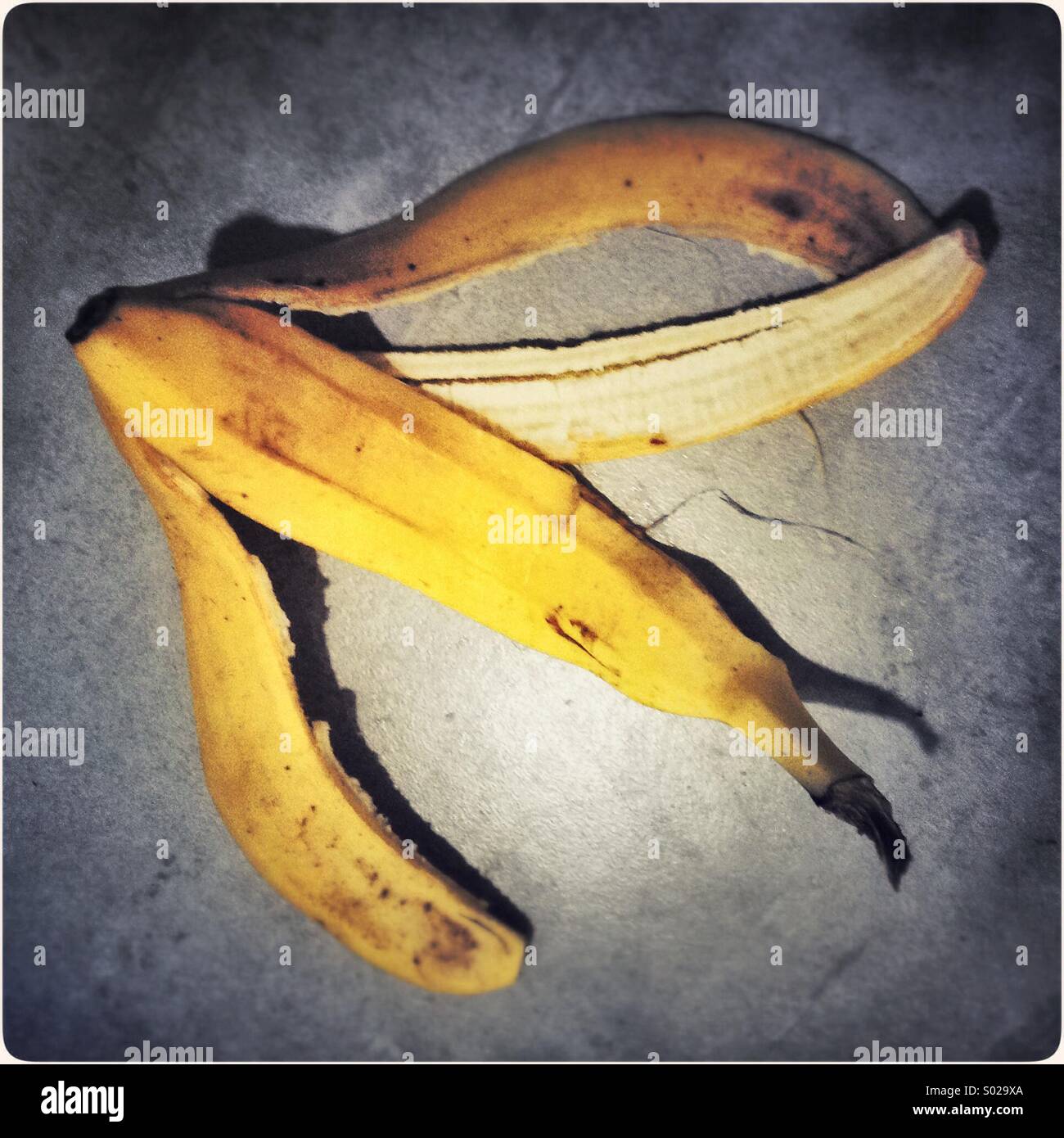 Banana peel skin on a floor - Smartphone Captured Stock Image