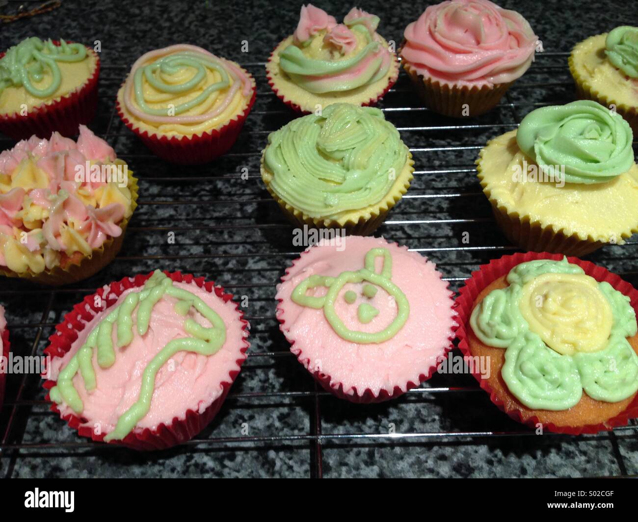 Home made cup cakes decorated with butter cream icing Stock Photo