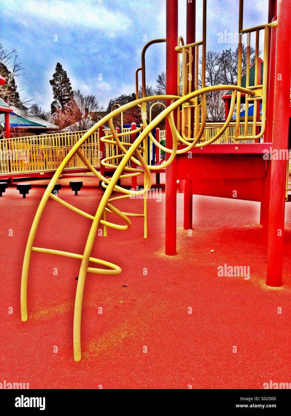 A highly stylized image of playground equipment at a suburban park. Stock Photo