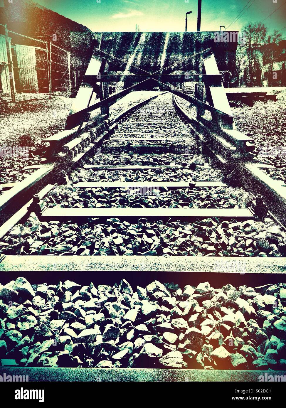 End of the line - railway tracks leading to buffers - Smartphone Captured Stock Image