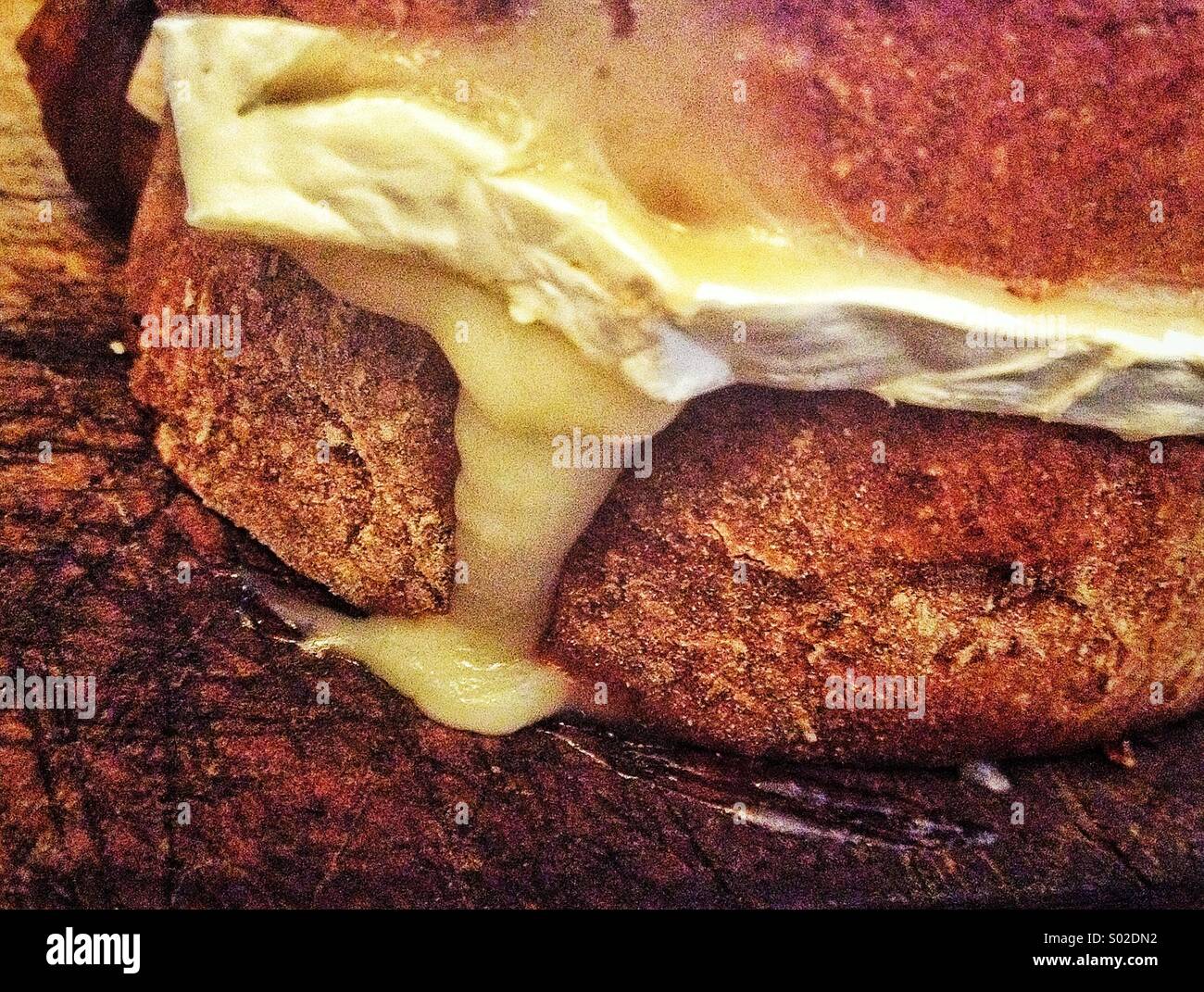 Ripe Brie on bread Stock Photo