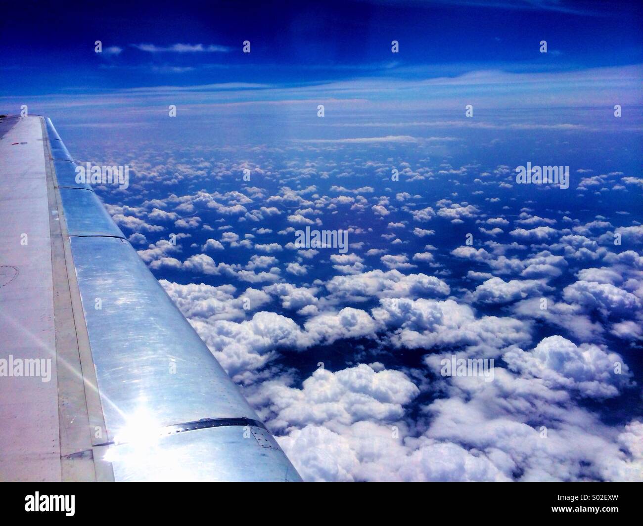 Clouds airplane hi-res stock photography and images - Alamy