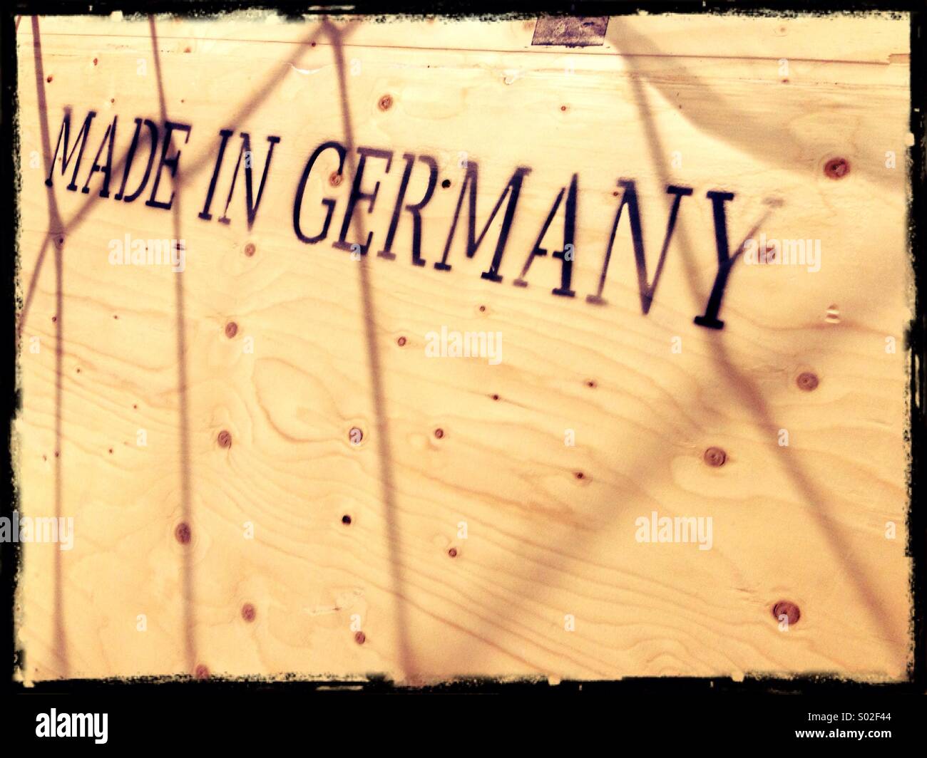 İnformation on wooden box while air transportation - Smartphone Captured Stock Image