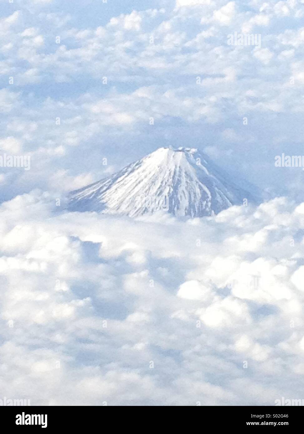Mount Fuji arial view from plane with cloud cover, Japan Tokyo Stock ...