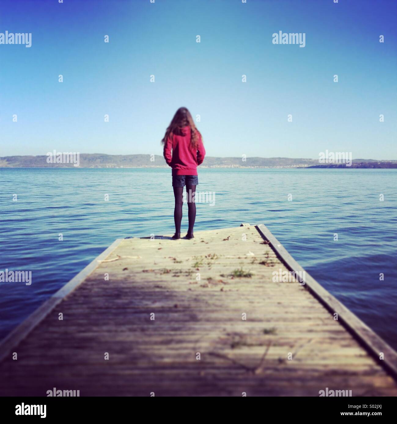 A lady in a pier - Smartphone Captured Stock Image