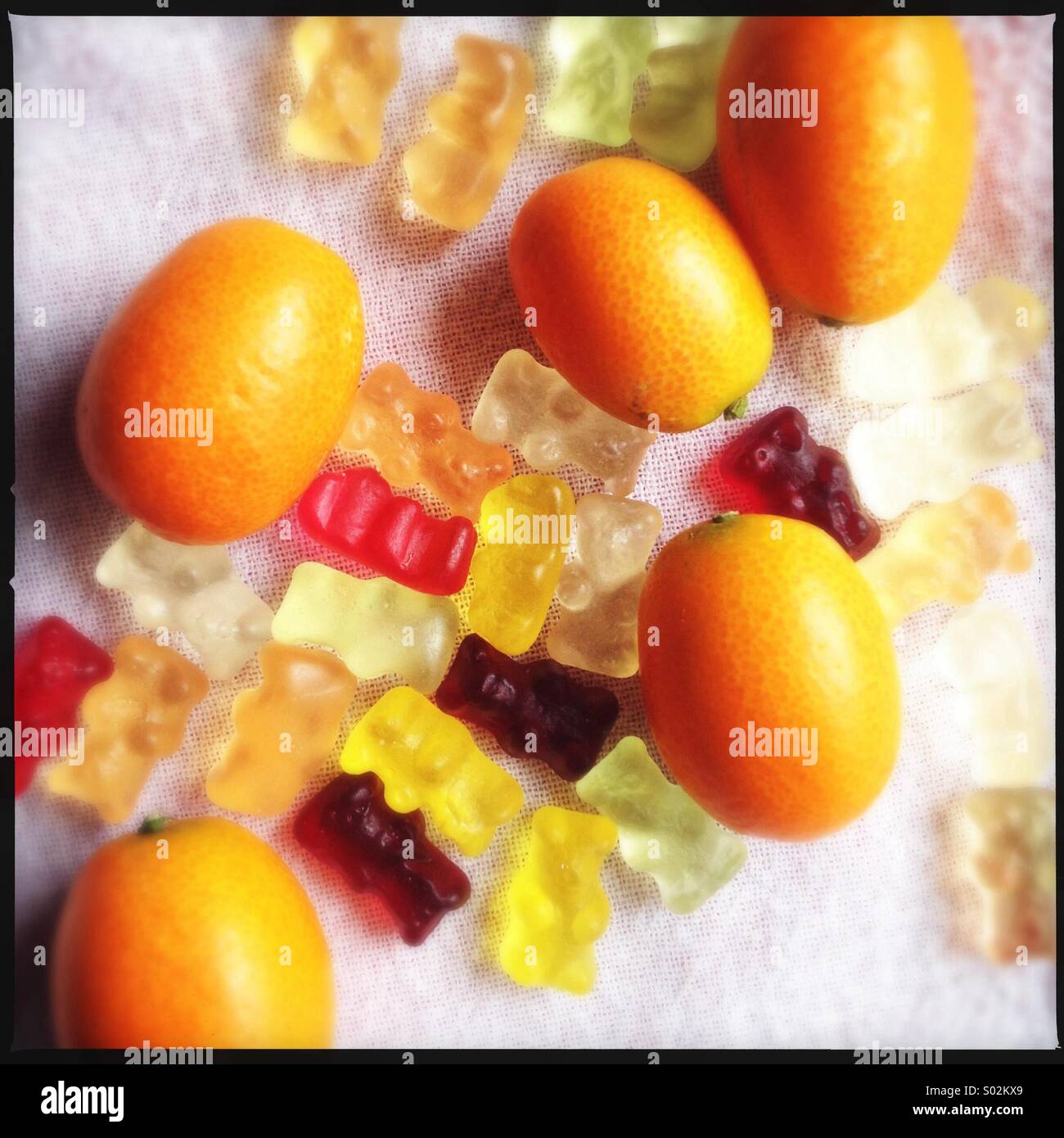 Kumquats and Gummy Bears Stock Photo