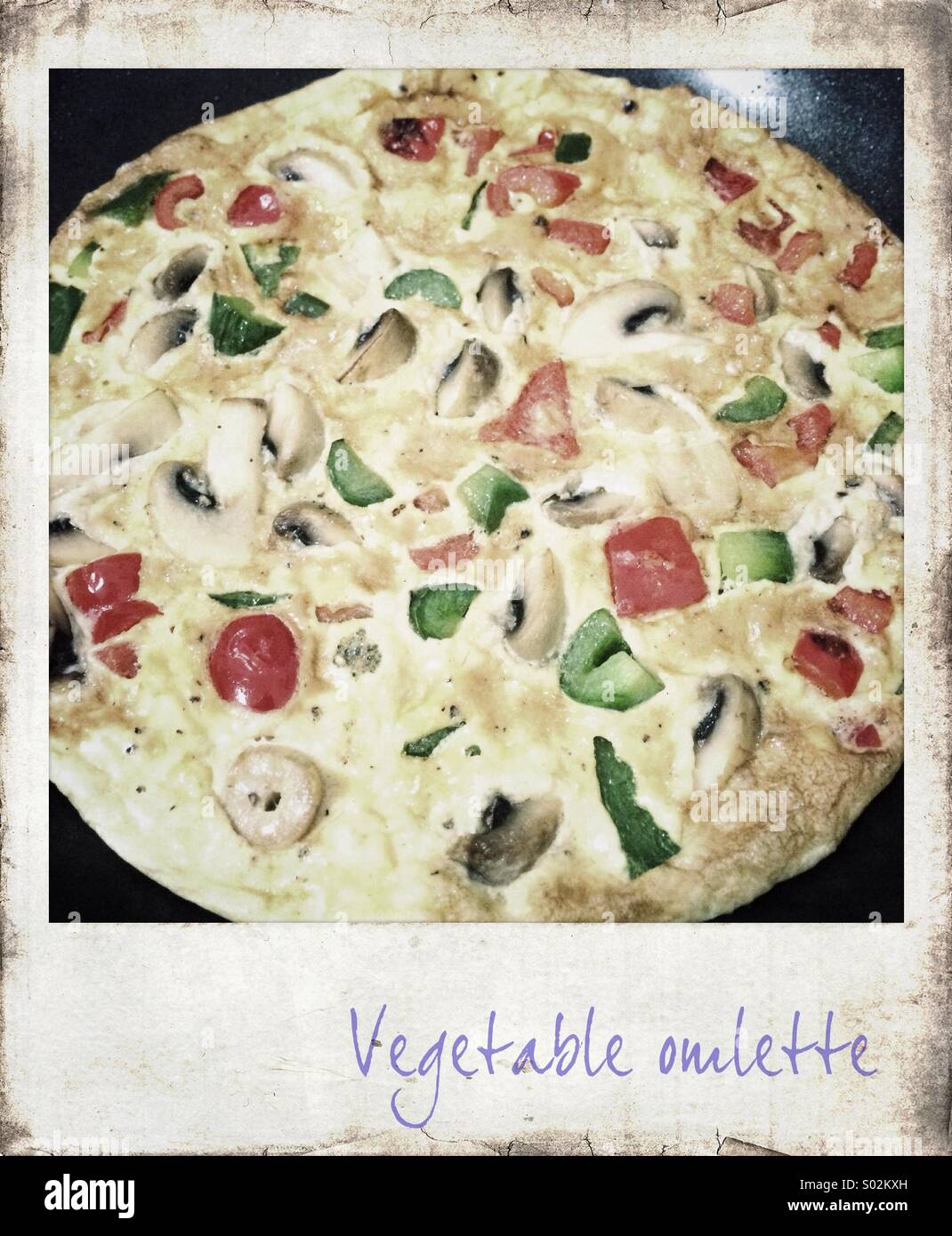 Polaroid picture of vegetable omlette Stock Photo