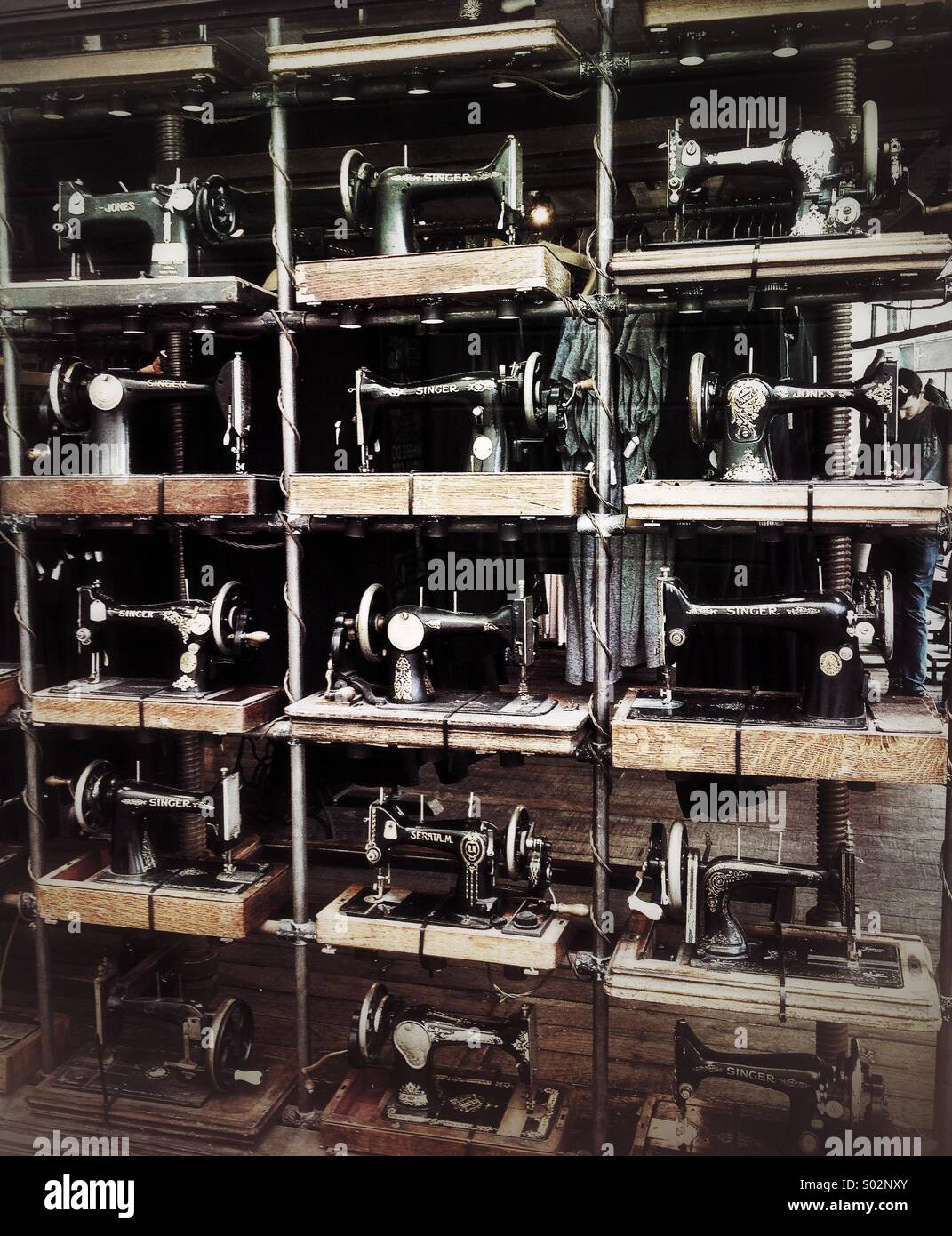 Window display with sewing machines hires stock photography and images