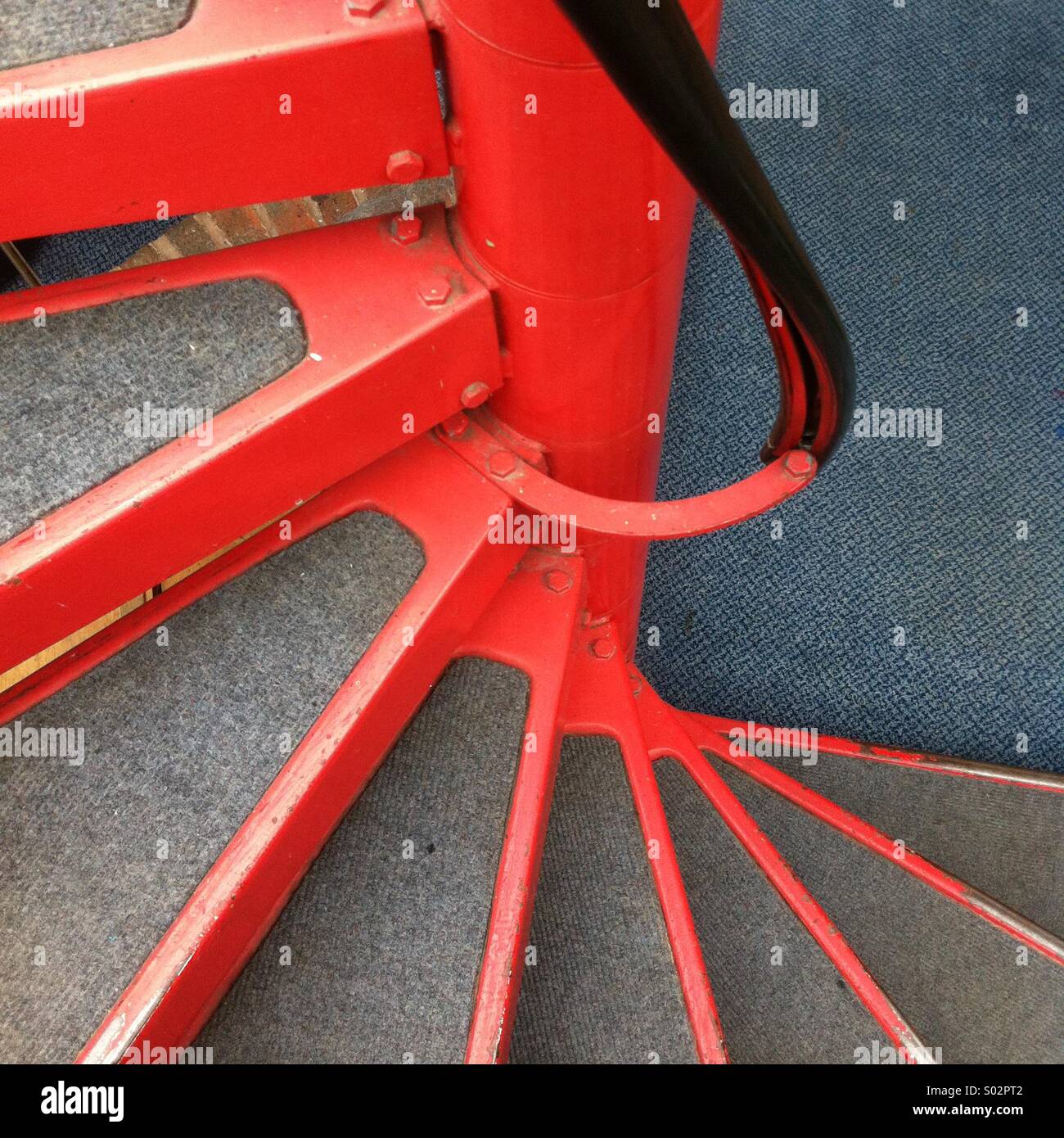 Red metal spiral staircase - Smartphone Captured Stock Image