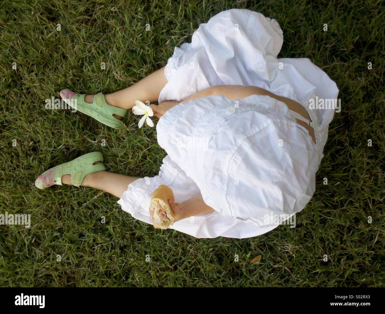 Four year old having a picnic in Darwin, Northern Territory, Australia. - Smartphone Captured Stock Image