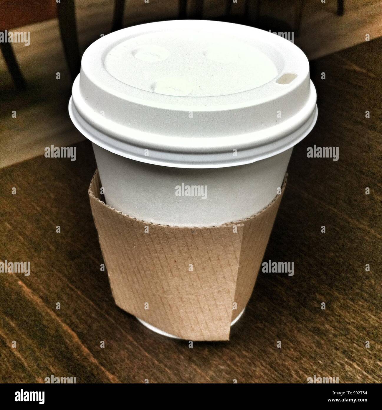 Coffee in a take-away paper cup - Smartphone Captured Stock Image