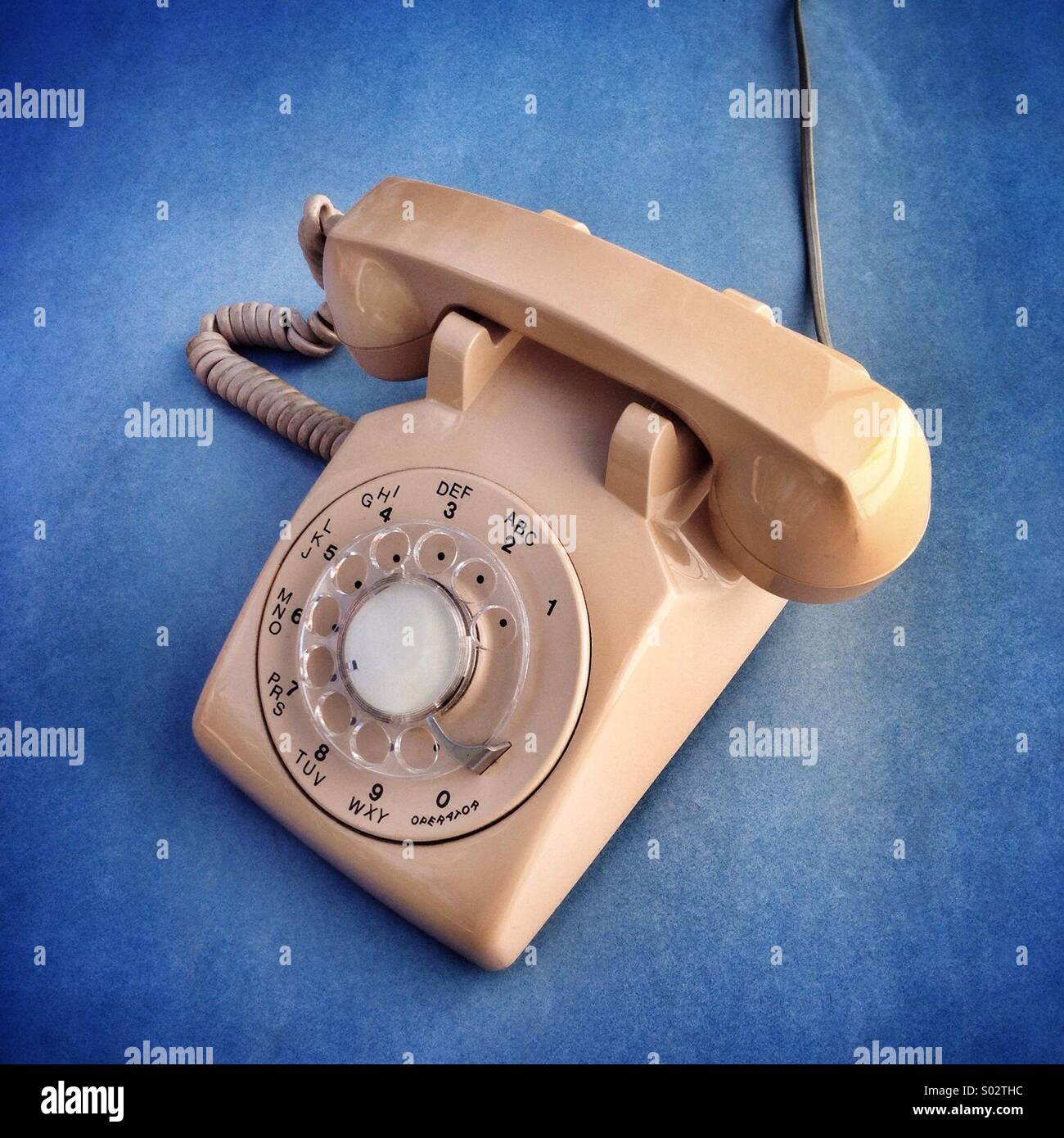 Vintage rotary dial phone. Stock Photo