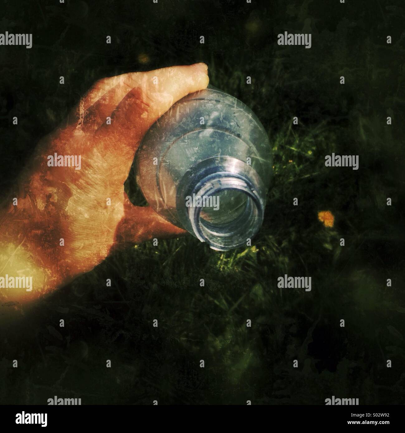Hand holding bottle hi-res stock photography and images - Alamy
