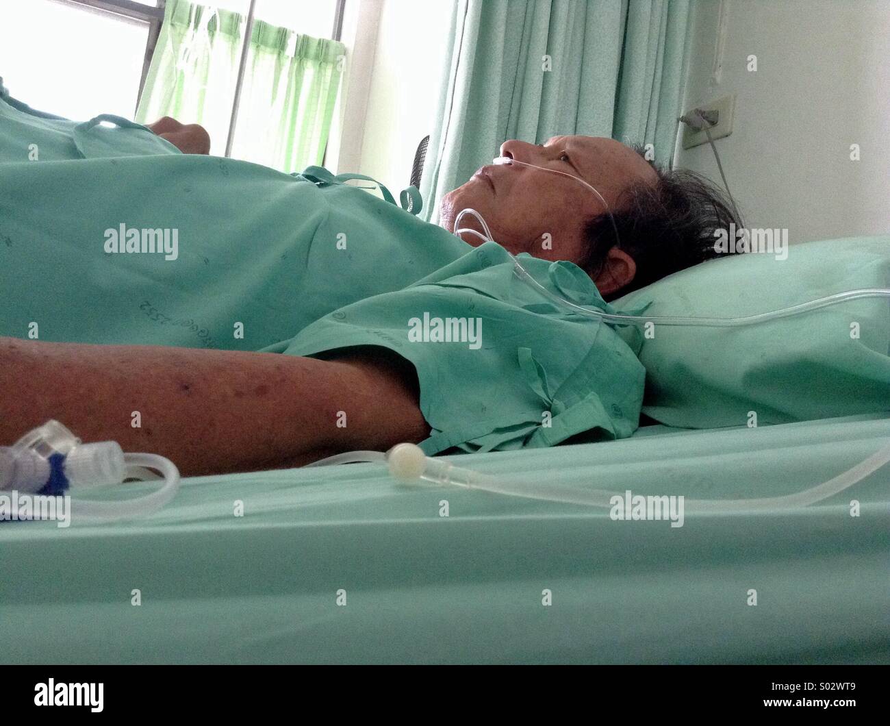 Old Man Hospital Bed Stock Photos & Old Man Hospital Bed Stock Images ...