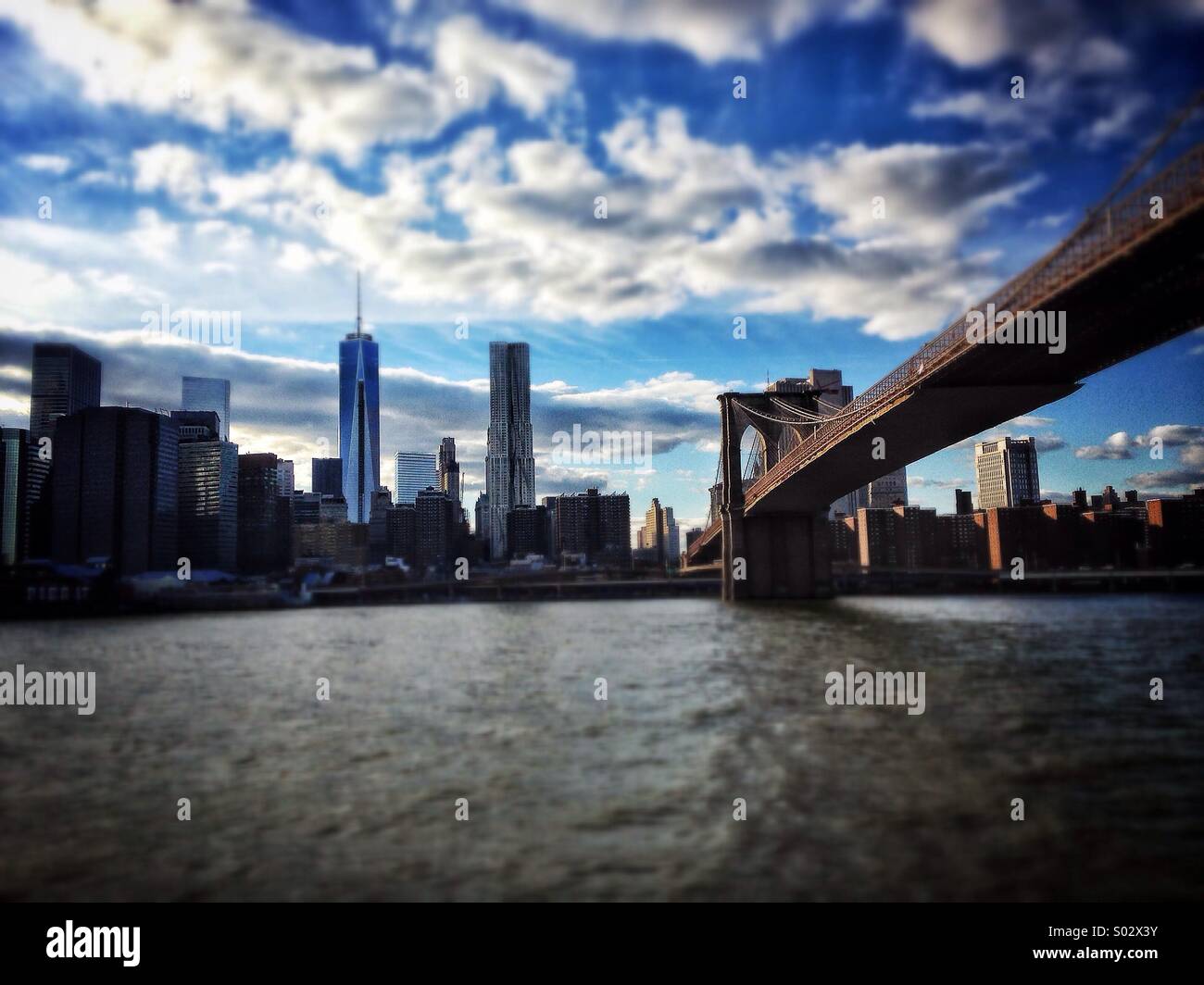 Manhattan skyline and Brooklyn bridge Stock Photo