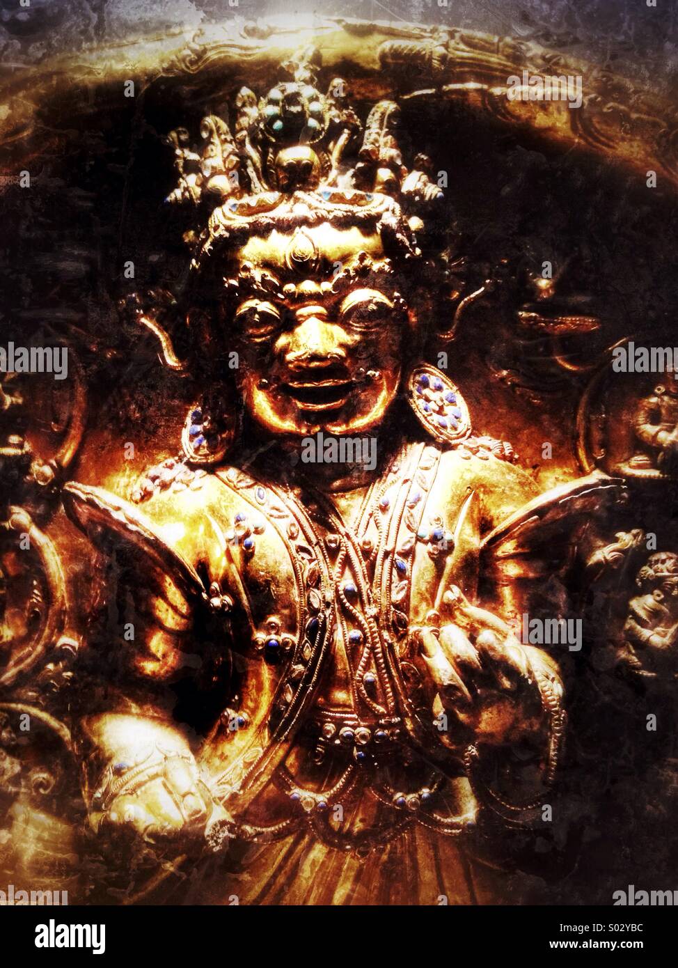 Tibetan Buddhist Deity Mahakala Gold Statue Stock Photo