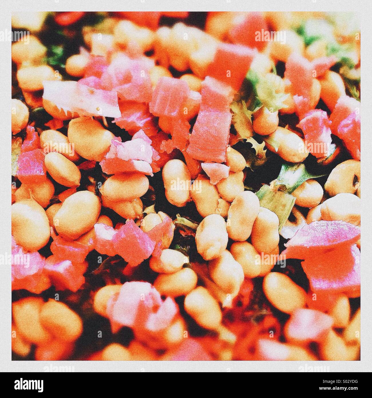 A broad beans salad with mint and ham. Typical fresh meal in Catalonia