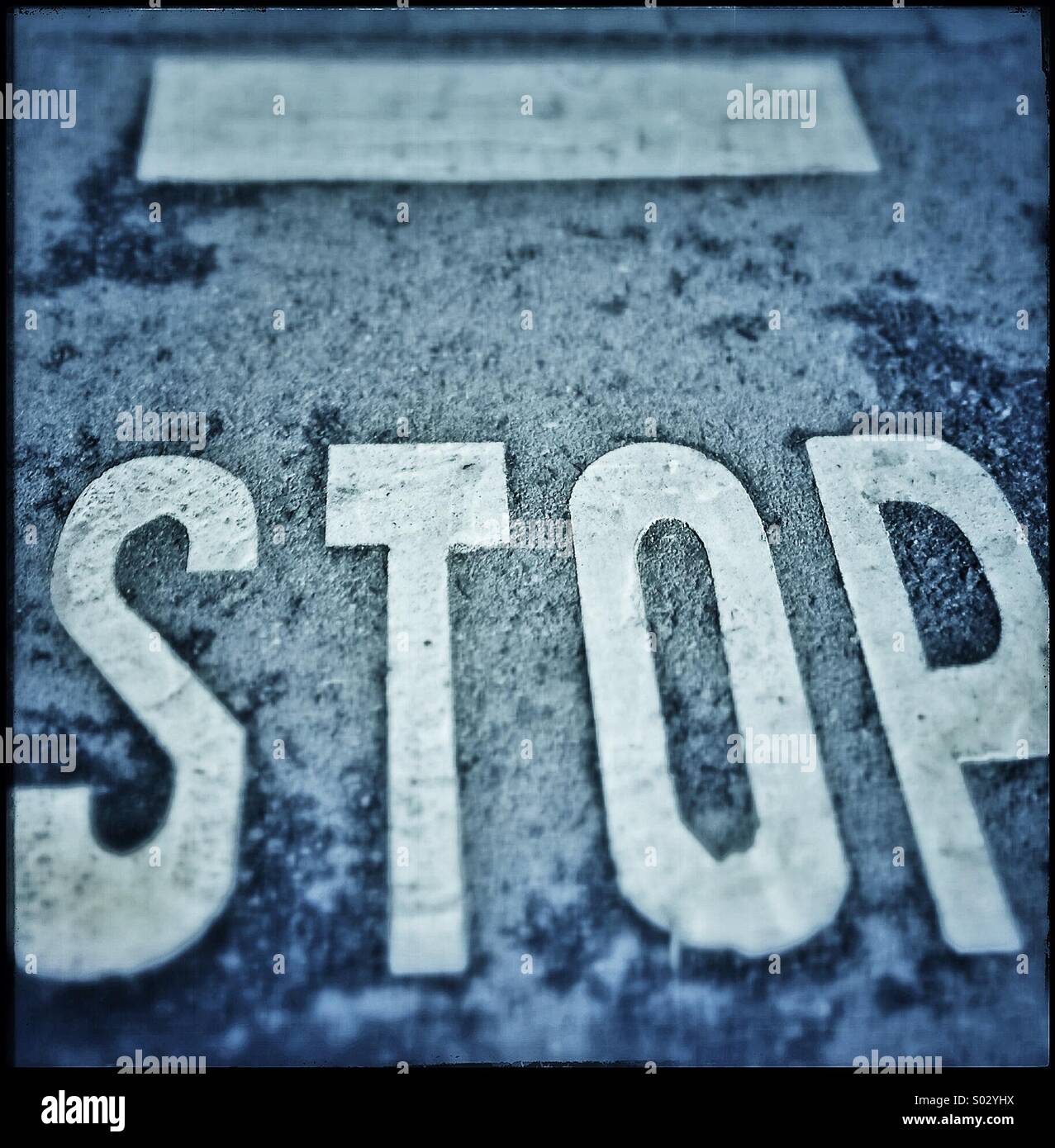 Stop sign on asphalt - Smartphone Captured Stock Image