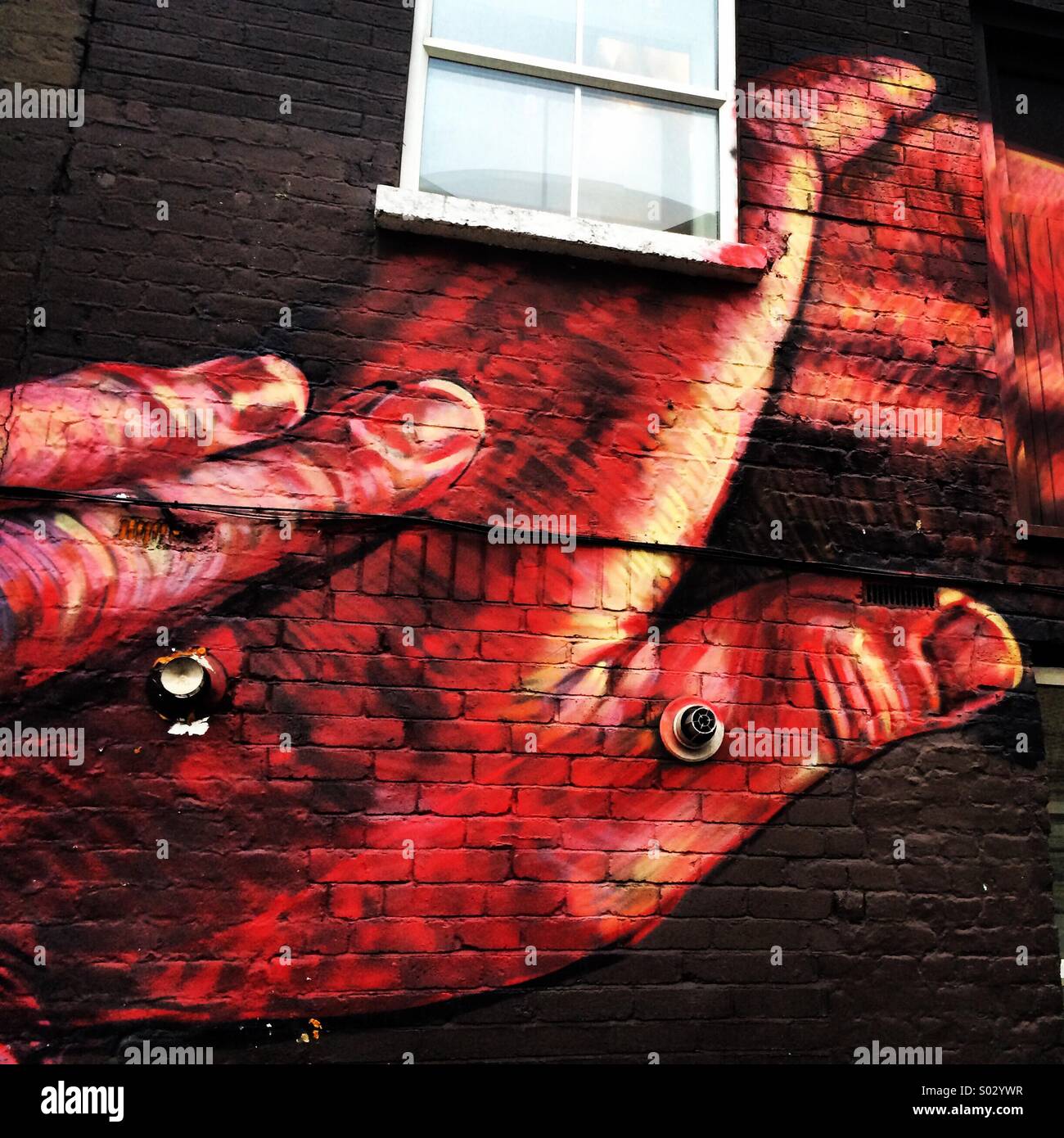 Hands Streetart, Shoreditch London Stock Photo