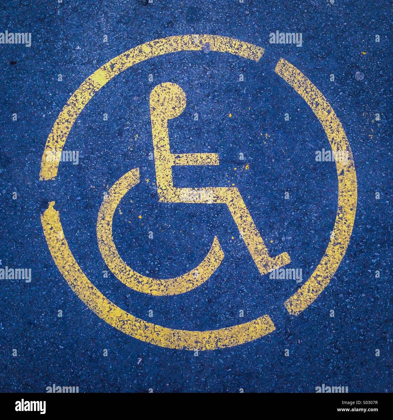 Disabled parking sign blue badge Stock Photo