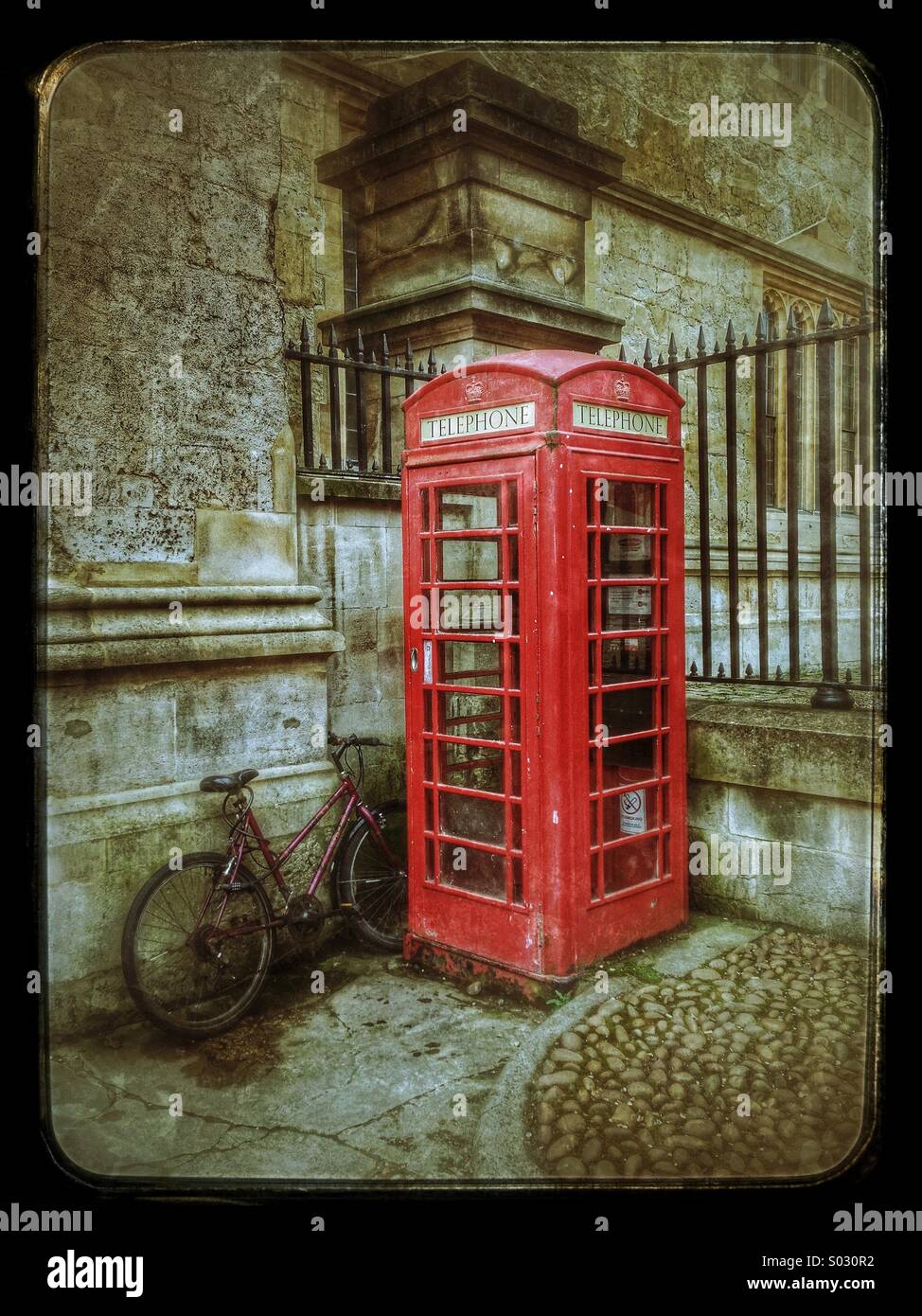 Red British Telephone Kiosk and Bicycle. Photo Credit - © COLIN HOSKINS. - Smartphone Captured Stock Image Red British Telephone Kiosk and Bicycle. Photo Credit - © COLIN HOSKINS. - Smartphone Captured Stock Image