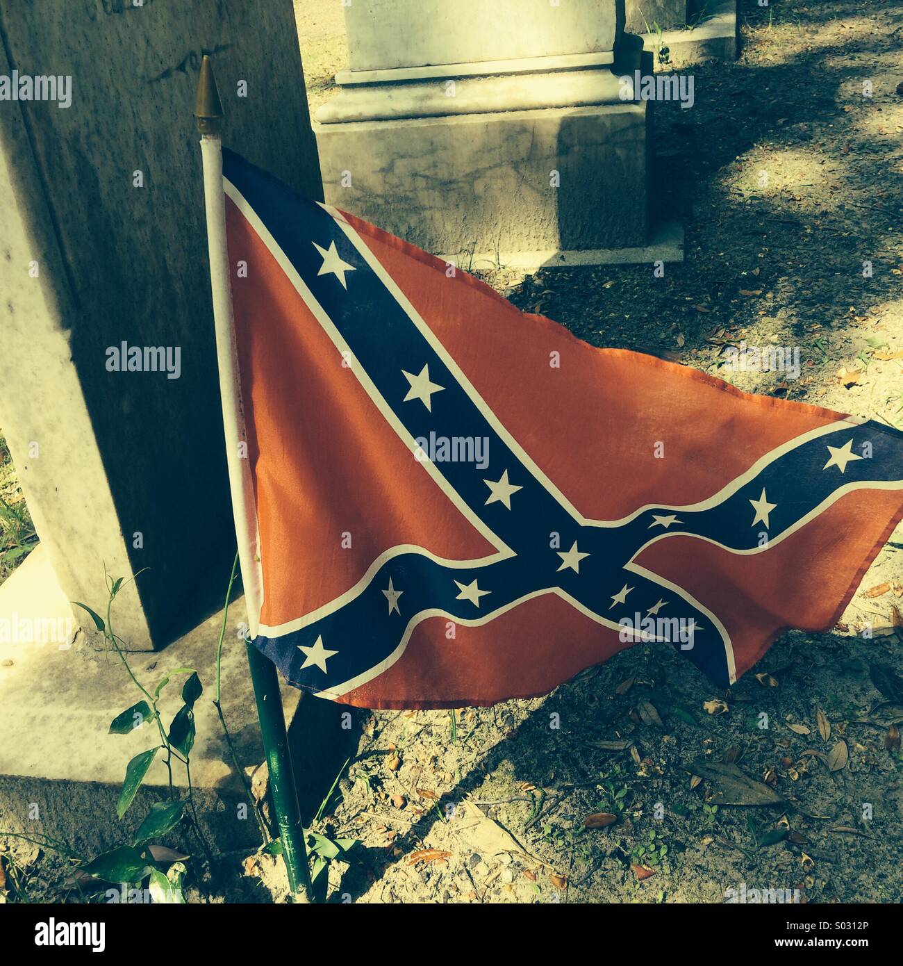 Confederate flag on a grave at the graveyard of Christ Church, St. Simon's Island, Georgia. Stock Photo