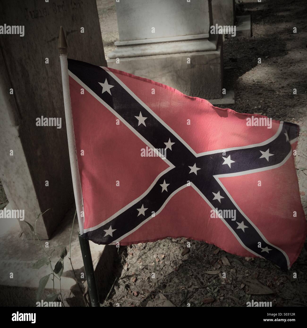 Confederate flag on a grave in the graveyard of Christ Church, St. Simon's Island, Georgia. Stock Photo