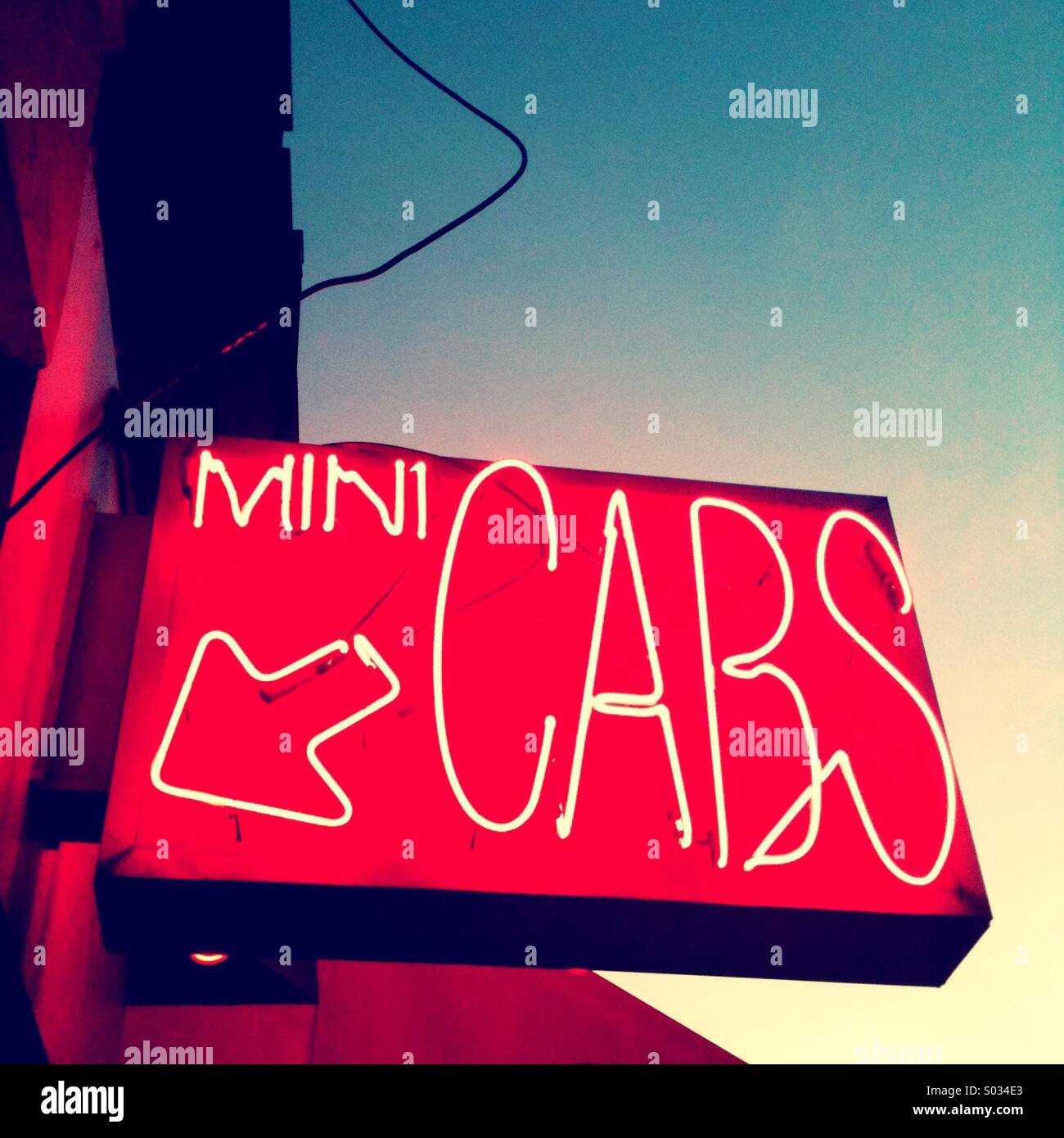 A Mini Cab Sign Stock Photo