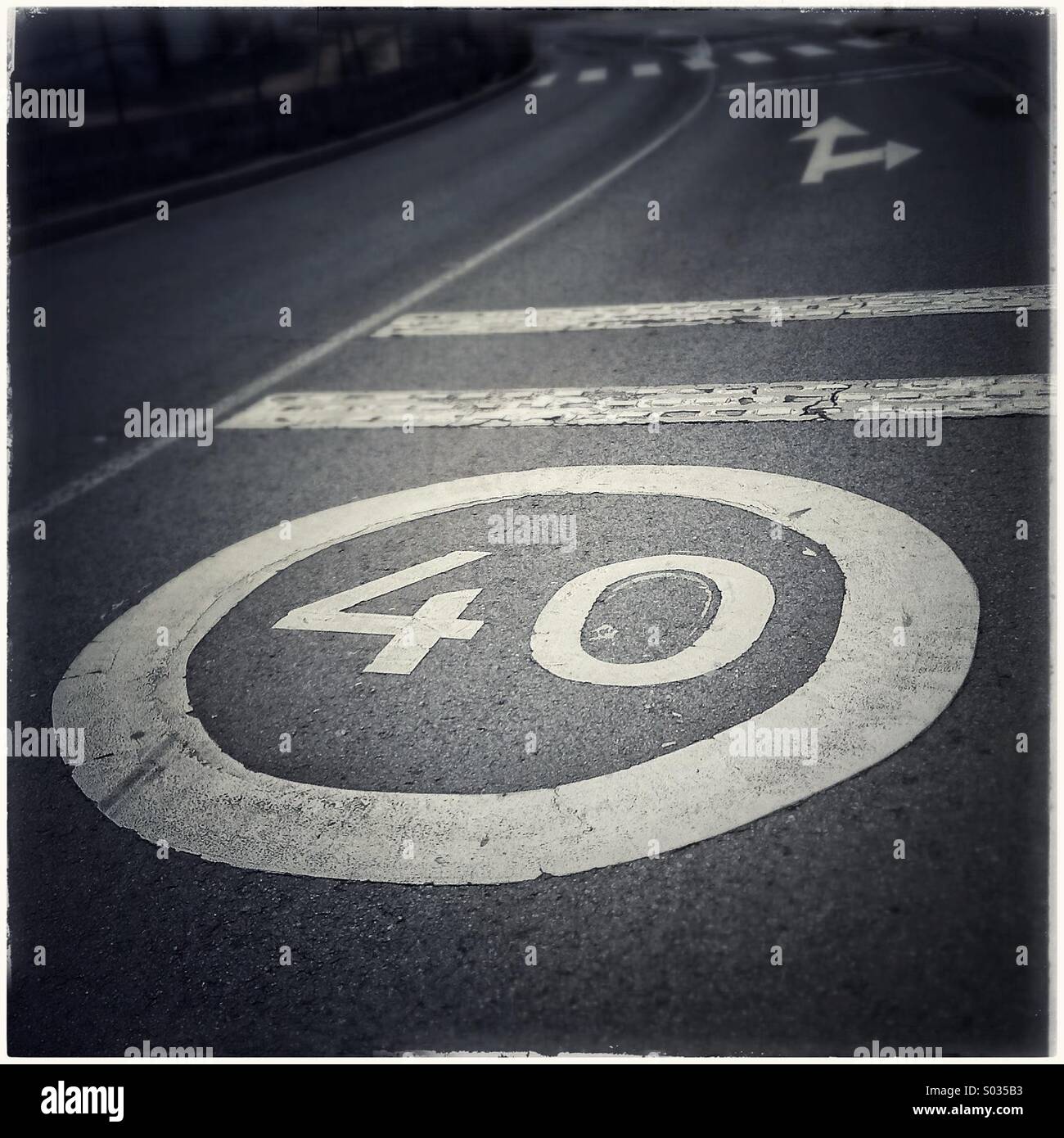40 speed limit traffic sign painted on asphalt road in Barcelona, Catalonia, Spain - Smartphone Captured Stock Image