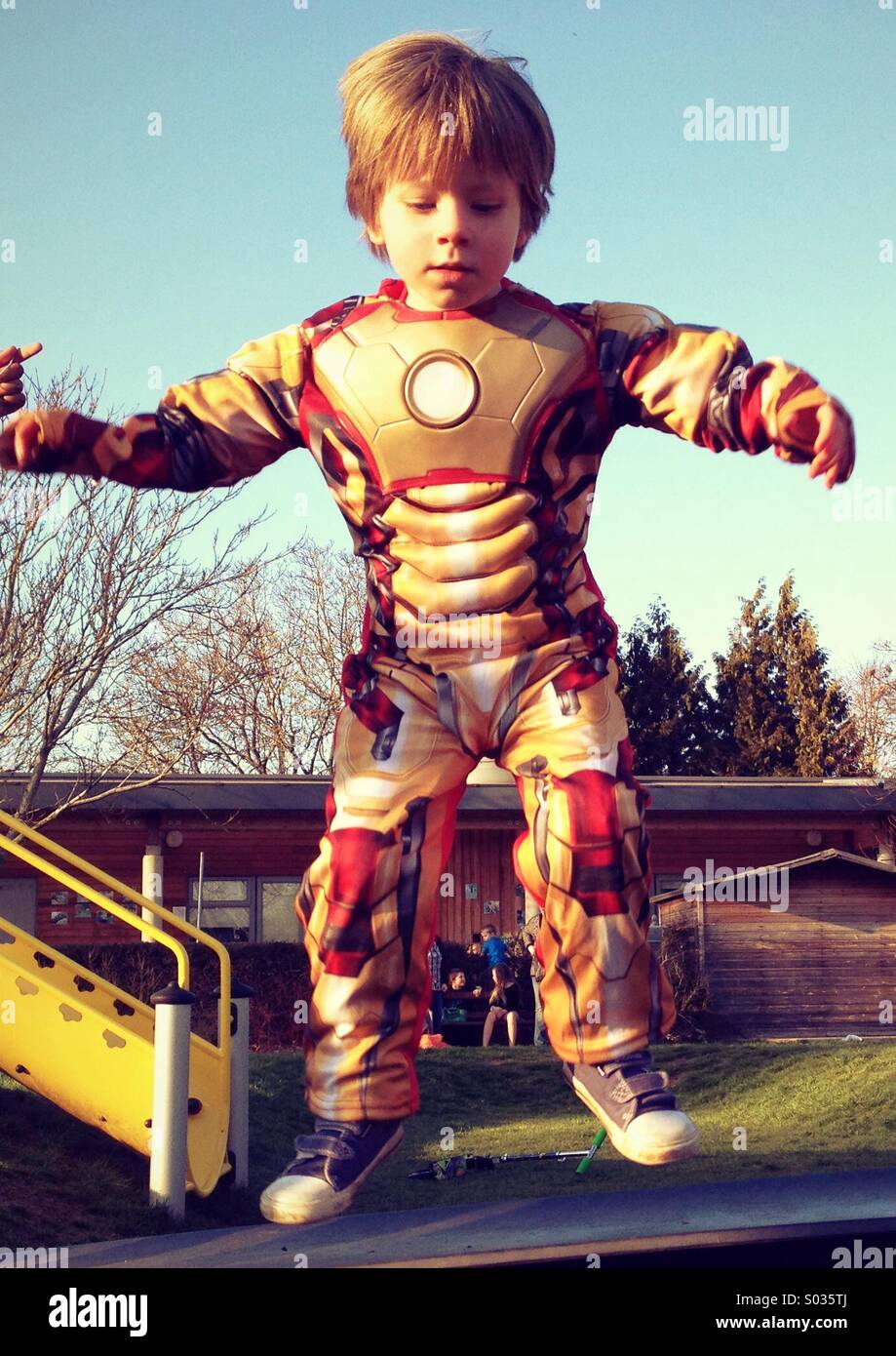 Iron boy In mid flight Stock Photo Alamy