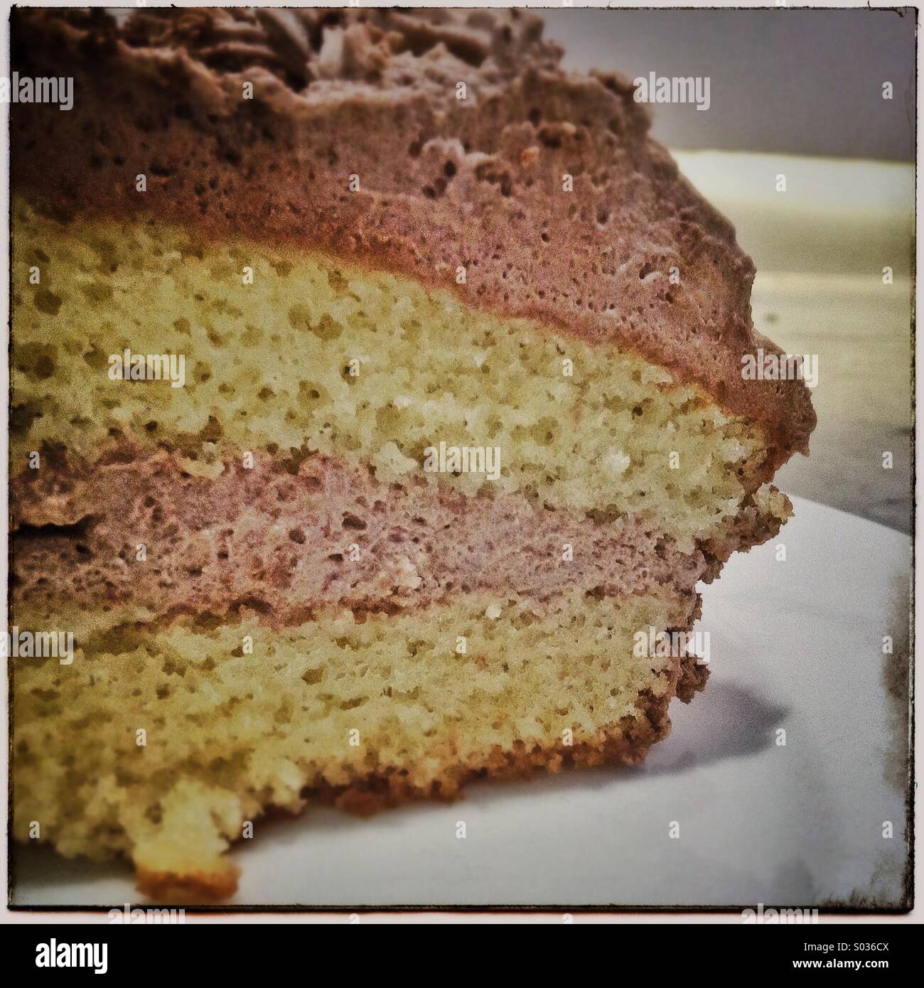A slice of home made gluten free birthday cake Stock Photo