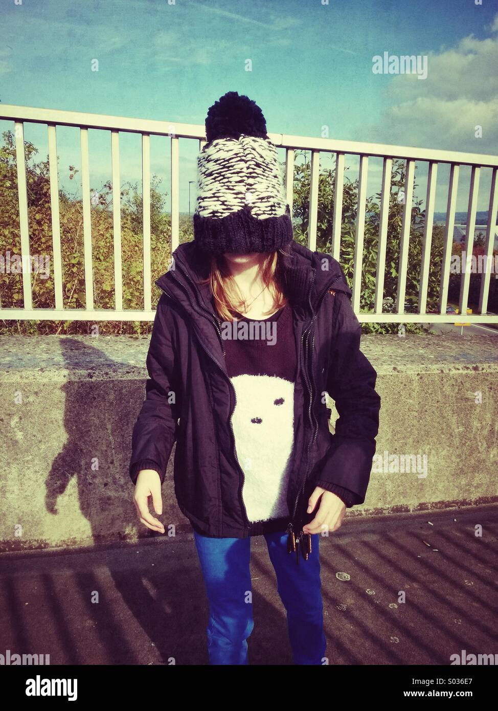 Hat covering girls face - Smartphone Captured Stock Image