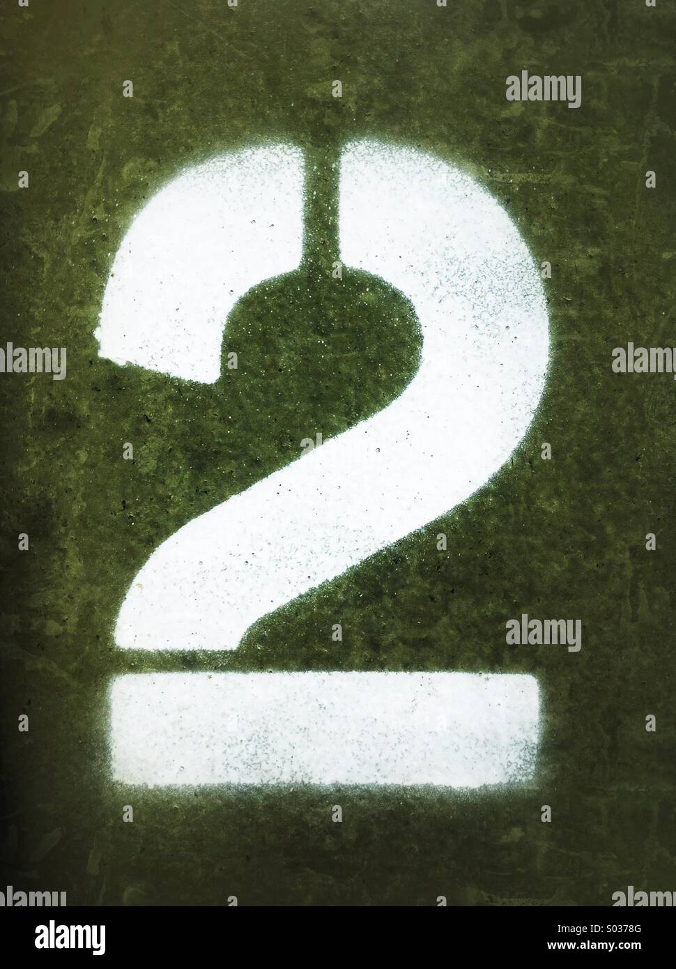 Number two 2 spray painted onto a metal shipping container - Smartphone Captured Stock Image