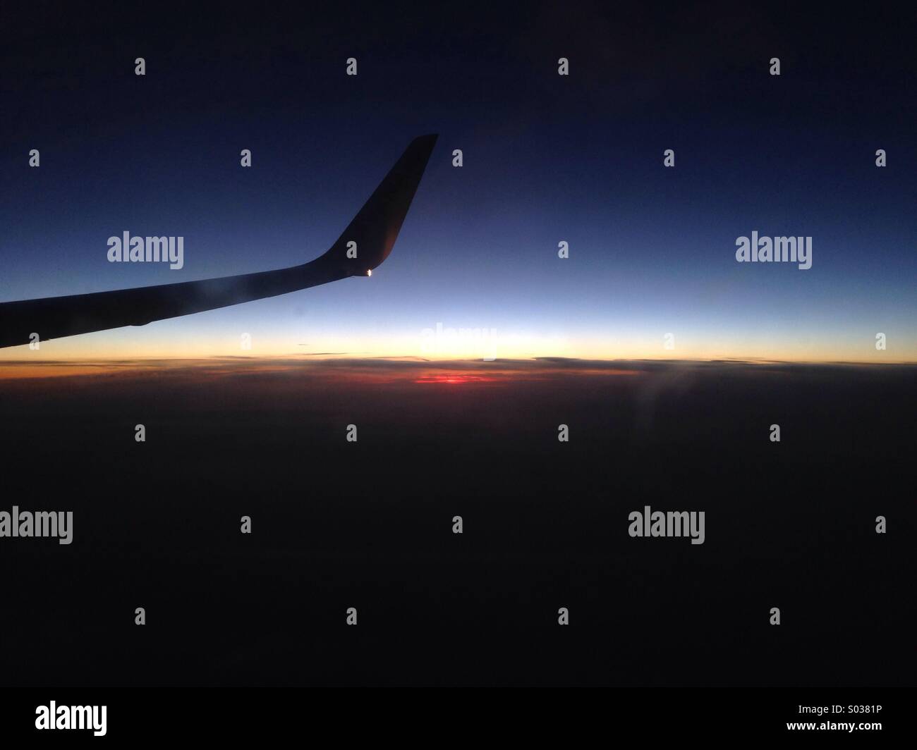 Flying in the sunset - Smartphone Captured Stock Image Flying in the sunset - Smartphone Captured Stock Image