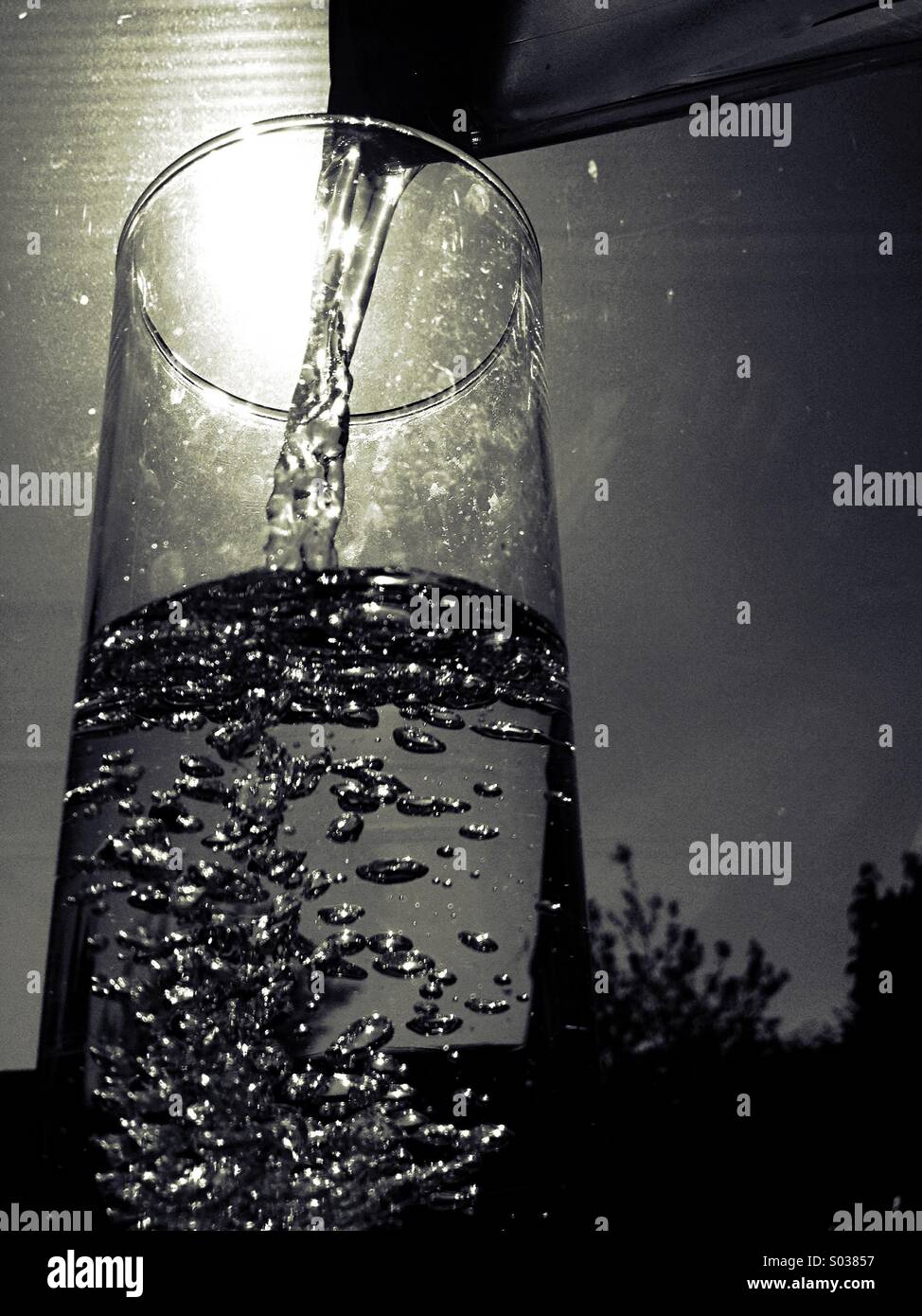 Pouring water in a glass - Smartphone Captured Stock Image