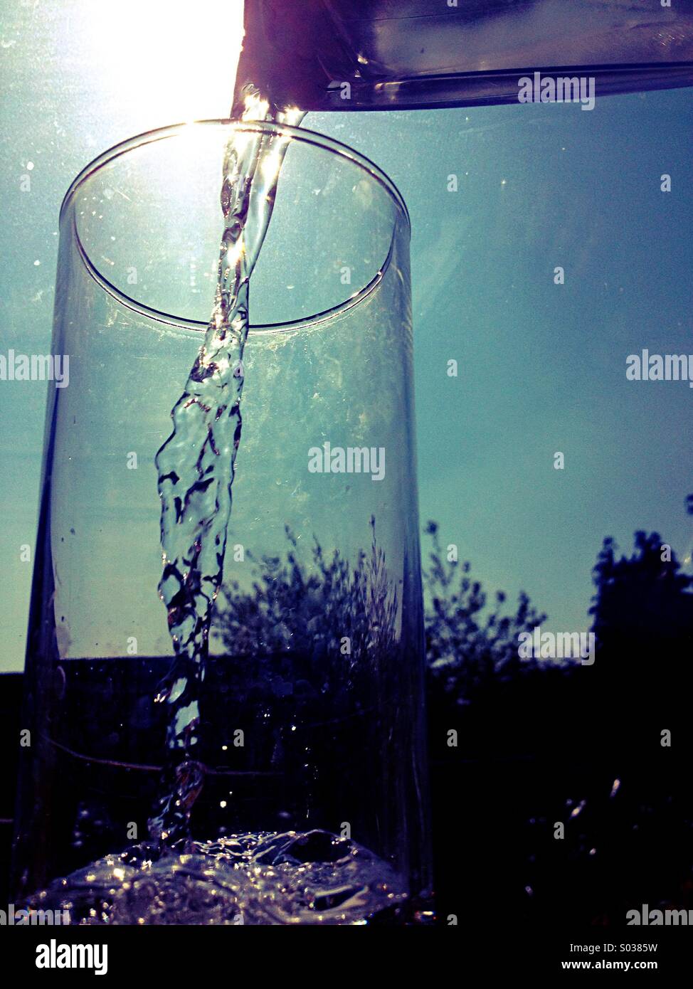 Pouring water in a glass - Smartphone Captured Stock Image