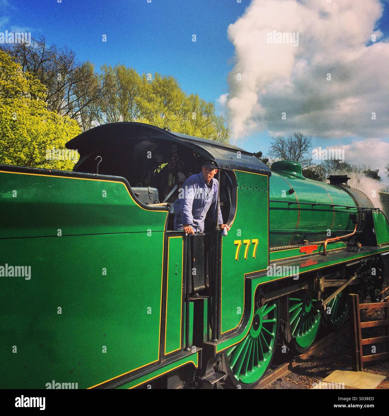 Great Central Railway steam locomotive engine train with driver. - Smartphone Captured Stock Image
