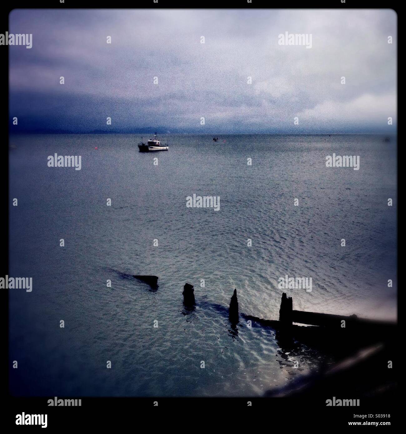 View out to sea at The Mumbles, South Wales on a gloomy day - Smartphone Captured Stock Image
