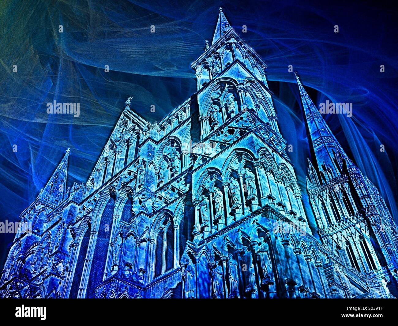 Creative Depiction of the West Front of Salisbury Cathedral, Wiltshire, England. The Tallest Spire in England is visible to the right of the picture. Converging Verticals due to use of iPhone lens. - Smartphone Captured Stock Image