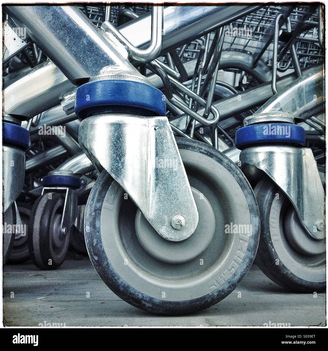Supermarket shopping cart trolley wheels Stock Photo - Alamy