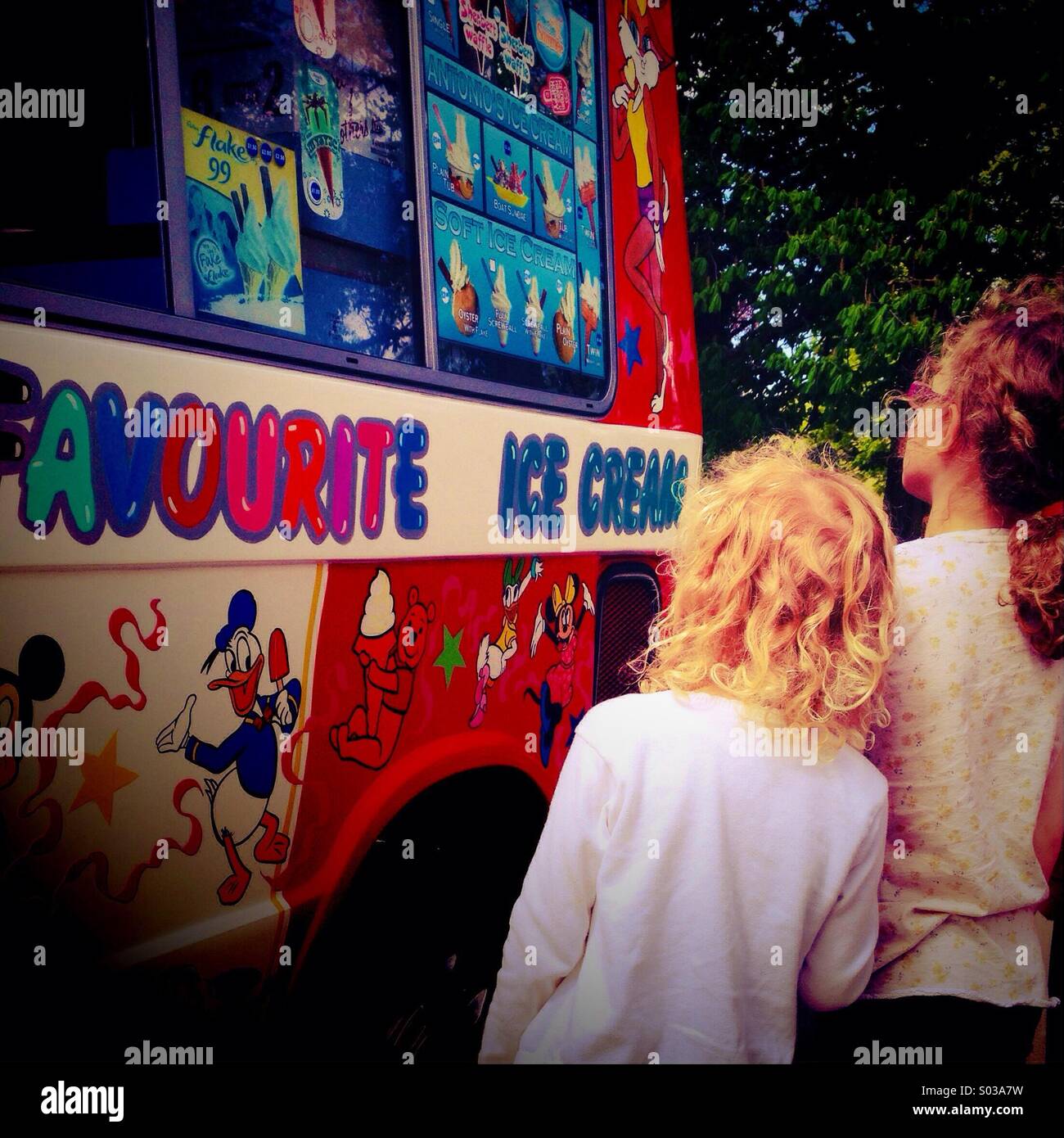 Two children looking at ice cream van - Smartphone Captured Stock Image