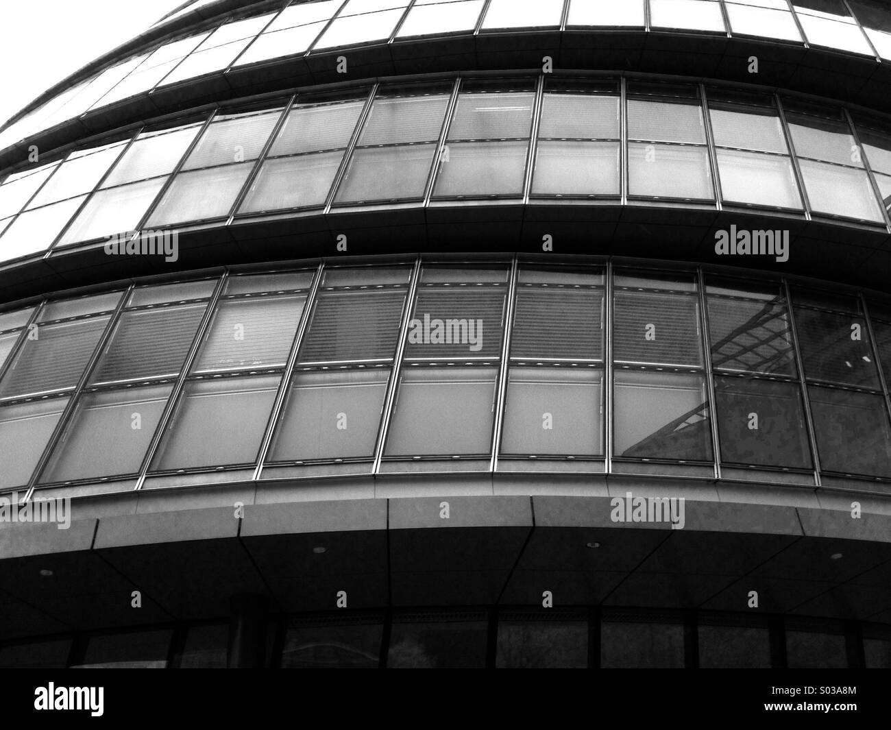 Grim and imposing windows of the London County Hall building - Smartphone Captured Stock Image