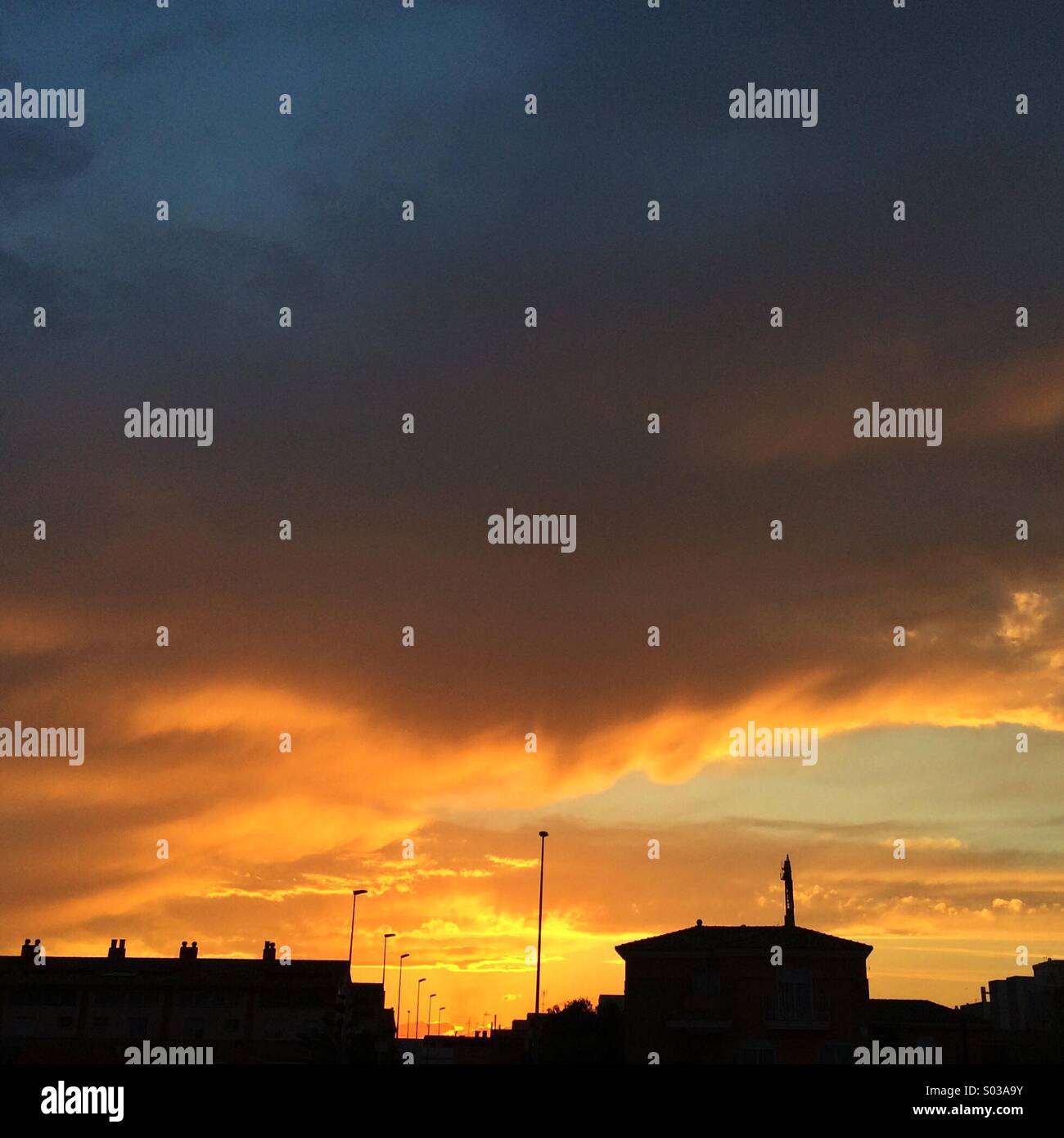 Sunset over the city. - Smartphone Captured Stock Image