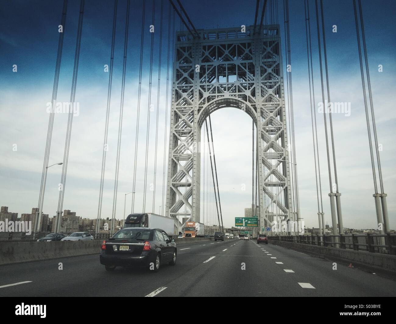 View from a car driving over the George Washington Bridge, from New Jersey to New York, USA. Stock Photo
