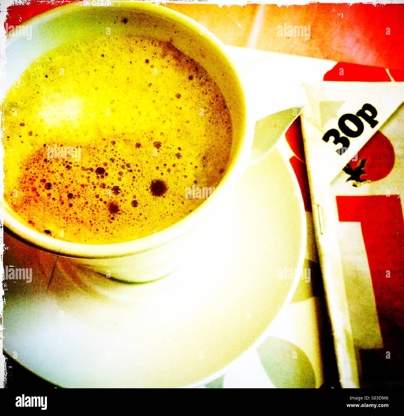 Cup of coffee and copy of the i newspaper - Smartphone Captured Stock Image