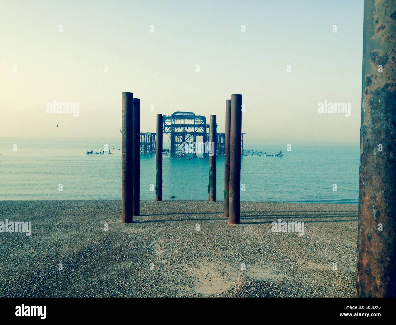 West Pier Brighton UK early morning light low tide Stock Photo