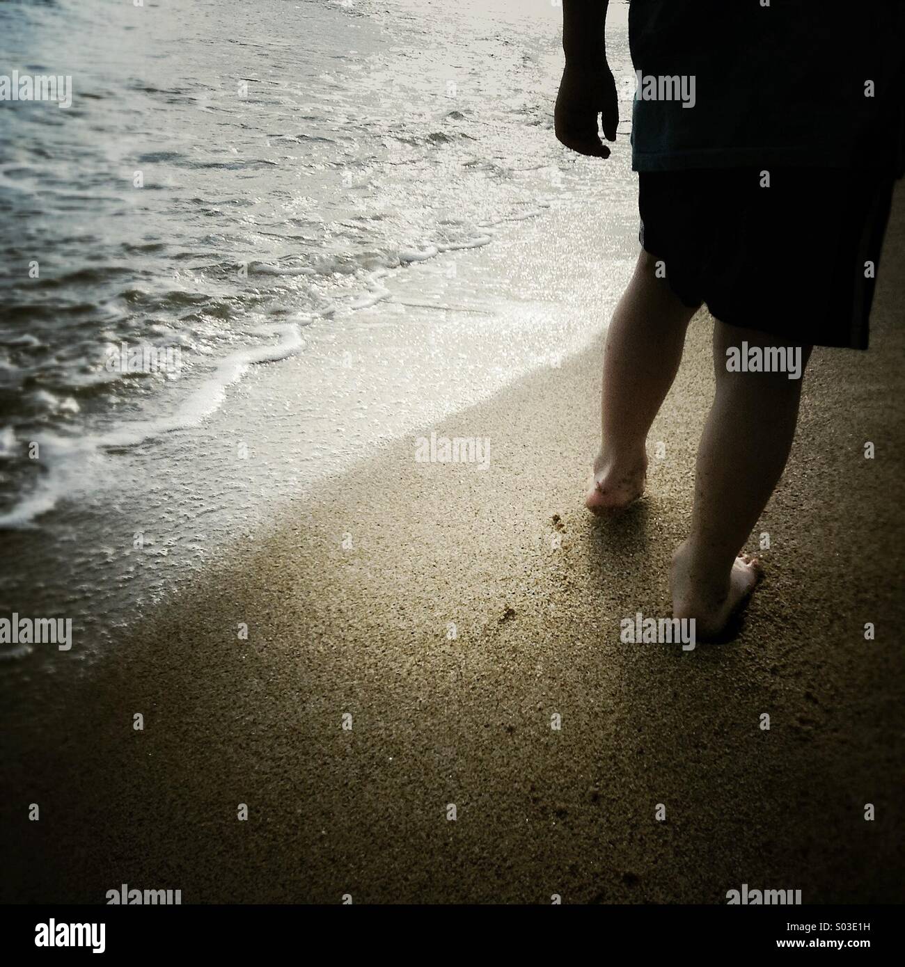Walking on the beach in Barcelona, mediterranean sea, Catalonia. Staring at sea Stock Photo