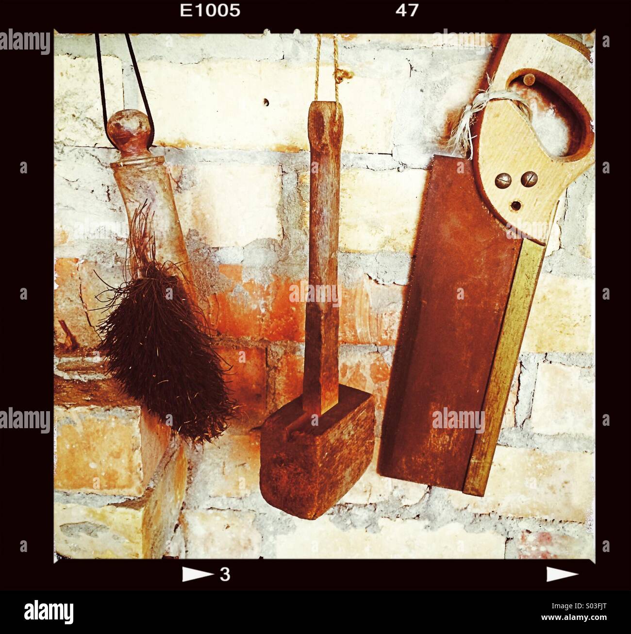 Tools and brush hanging up - Smartphone Captured Stock Image