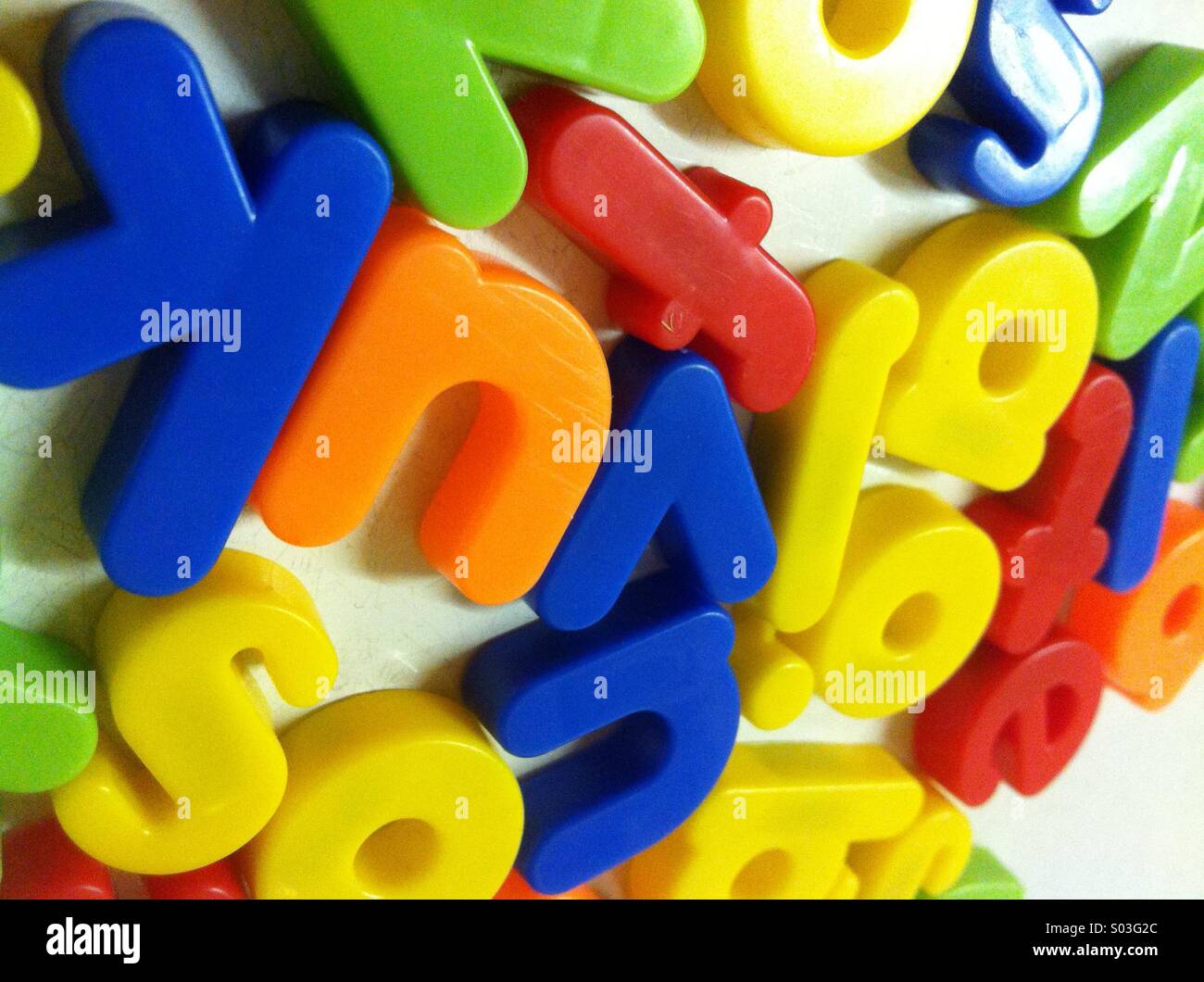 A jumble of random letter magnets Stock Photo