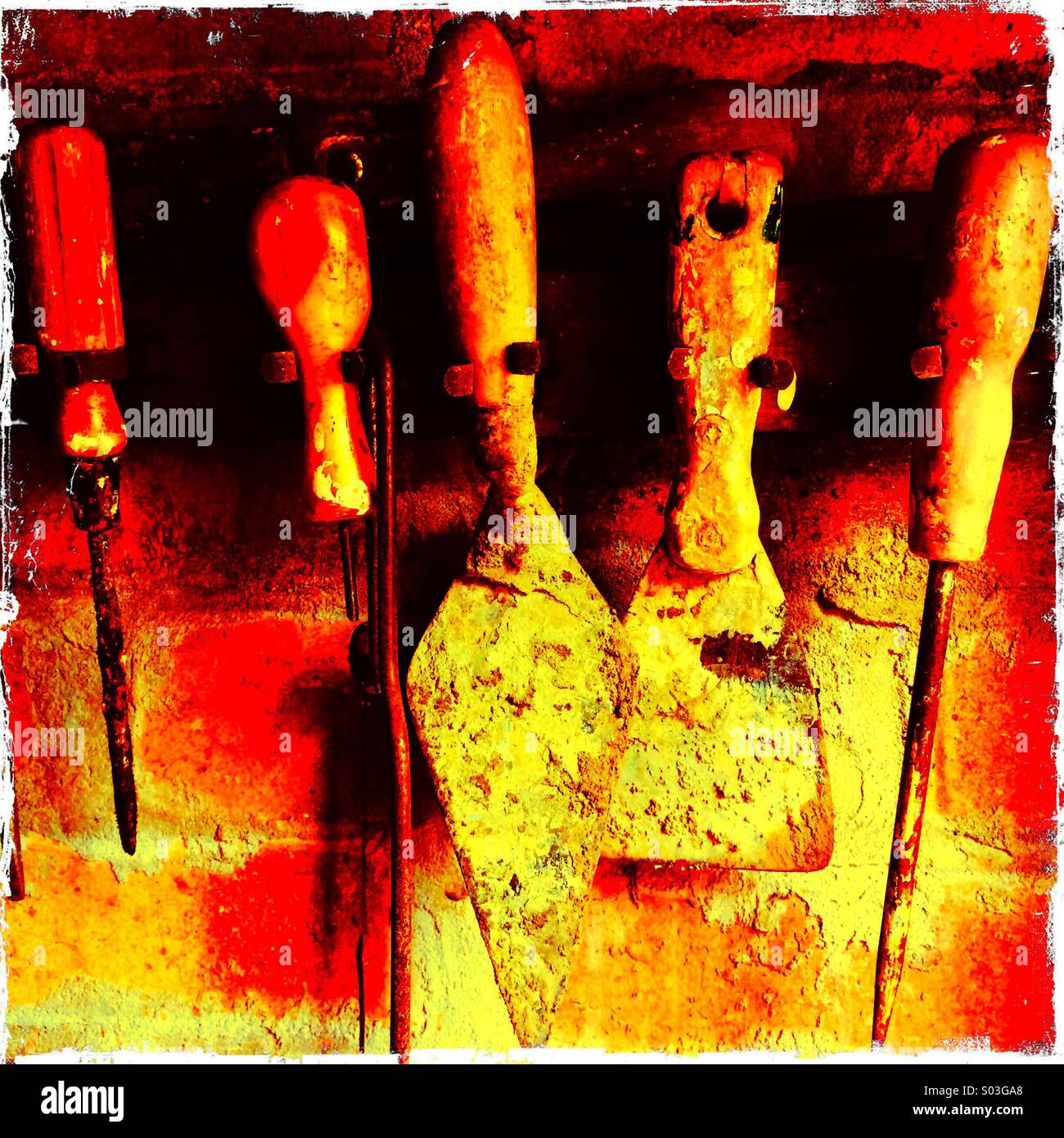 Line of dirty paint splattered old tools in a shed - Smartphone Captured Stock Image